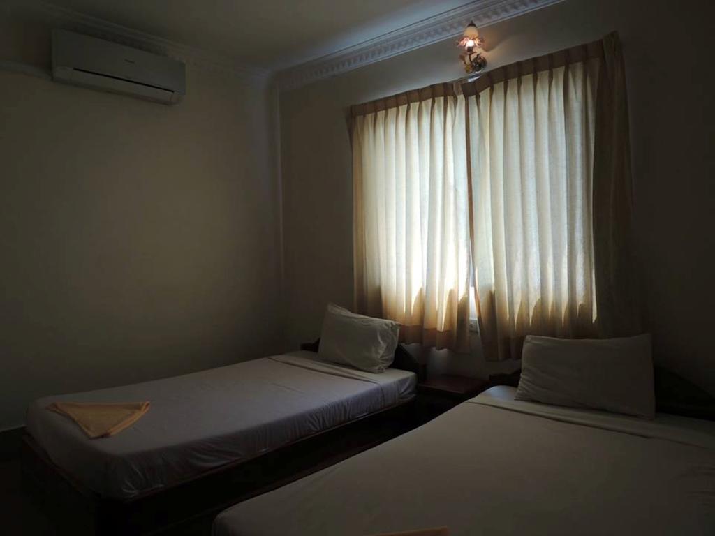 เซี่ยงไฮ้ เกสท์เฮาส์ Hotel พระตะบอง ห้อง รูปภาพ